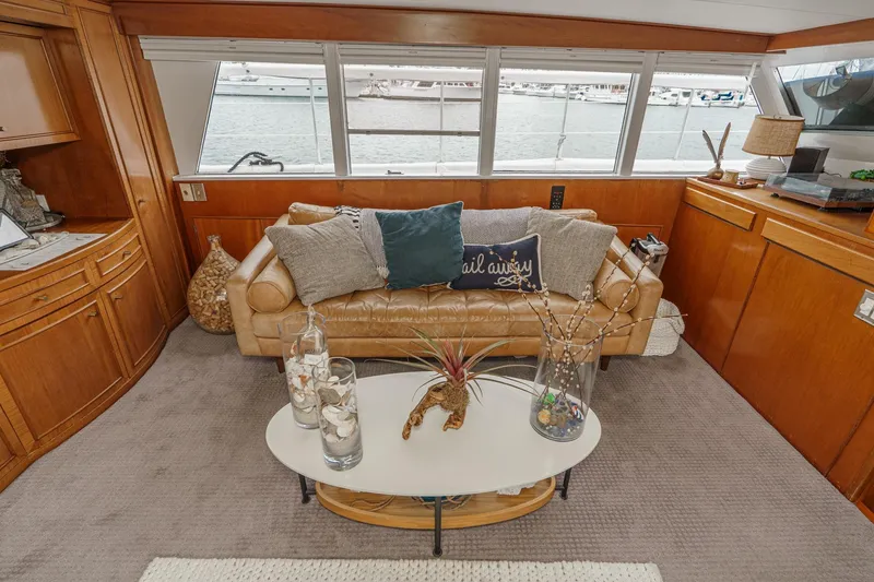 Slide: The Image of Luxurious 1969 Burger Flush Deck yacht interior with cozy seating and nautical decor. - 39