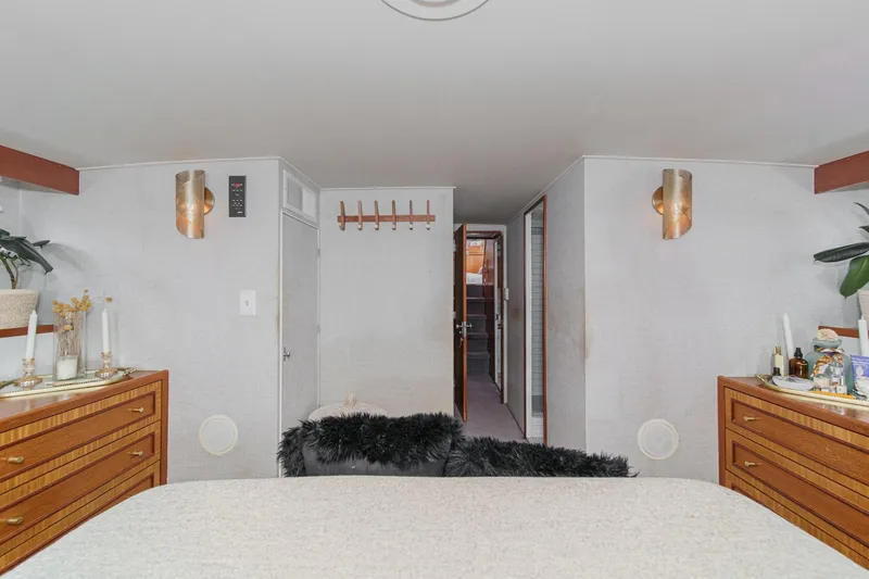 Slide: The Image of Luxurious 1969 Burger Flush Deck yacht interior with elegant wood furnishings and modern decor. - 51