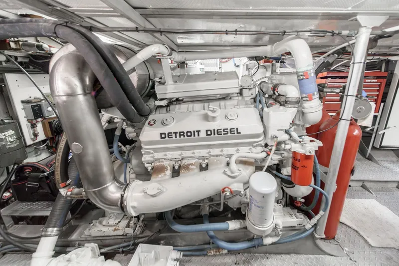 Slide: The Image of Engine room of a 1969 Burger Flush Deck yacht featuring a Detroit Diesel engine. - 72