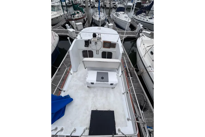 Slide: The Image of 1985 Transpacific Marine Pacific Eagle 32 yacht docked at marina, view from deck. - 10