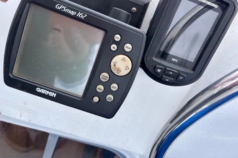 Slide: The Image of Garmin GPSMap 162 and Humminbird 197c on 1985 Transpacific Marine Pacific Eagle 32. - 17
