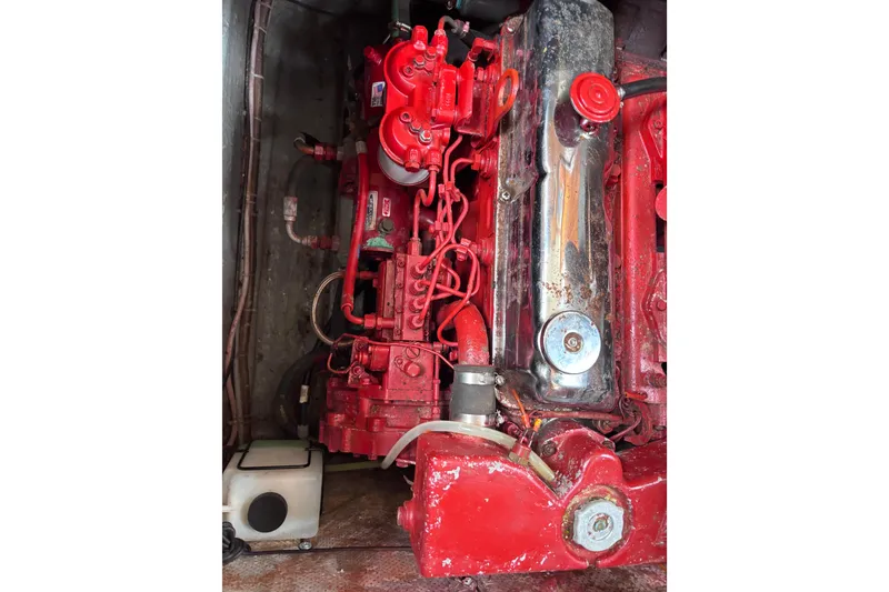 Slide: The Image of Red engine of 1985 Transpacific Marine Pacific Eagle 32 boat, detailed view. - 33