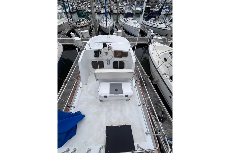 Slide: The Image of 1985 Transpacific Marine Pacific Eagle 32 boat docked at marina, view from deck. - 9