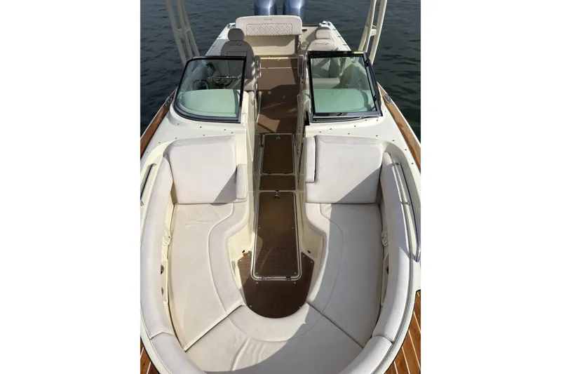 Slide: The Image of 2017 Chris-Craft Calypso 26 boat interior with spacious seating and elegant design. - 7