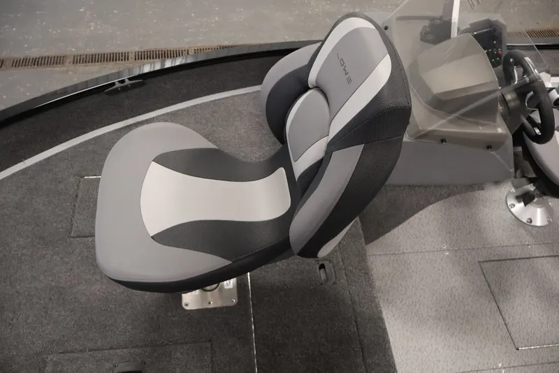 Slide: The Image of 2027 Lowe Fishing Machine 1625SC boat seat, gray and black design, cockpit view. - 27