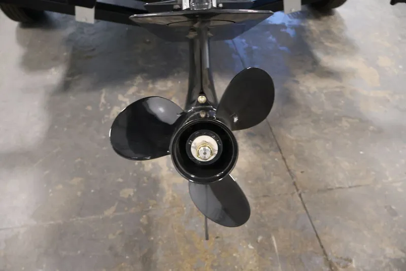 Slide: The Image of Propeller of 2027 Lowe Fishing Machine 1625SC on concrete floor. - 18