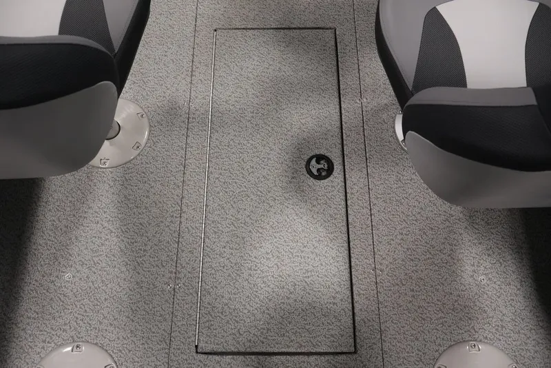 Slide: The Image of 2027 Lowe Fishing Machine 1625SC interior with gray carpet and seating. - 31