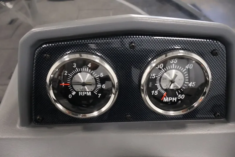 Slide: The Image of Dashboard of 2027 Lowe Fishing Machine 1625SC with RPM and MPH gauges. - 15