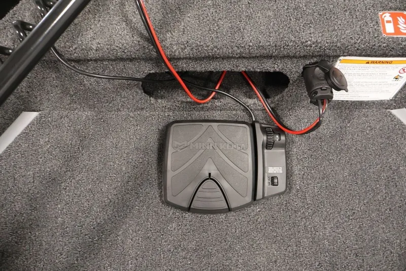 Slide: The Image of Foot pedal control on 2027 Lowe Fishing Machine 1625SC boat, featuring Minn Kota branding. - 14