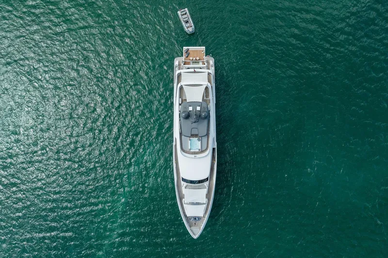 Slide: The Image of Aerial view of 2023 Custom Line Navetta 33 yacht on open water. - 19