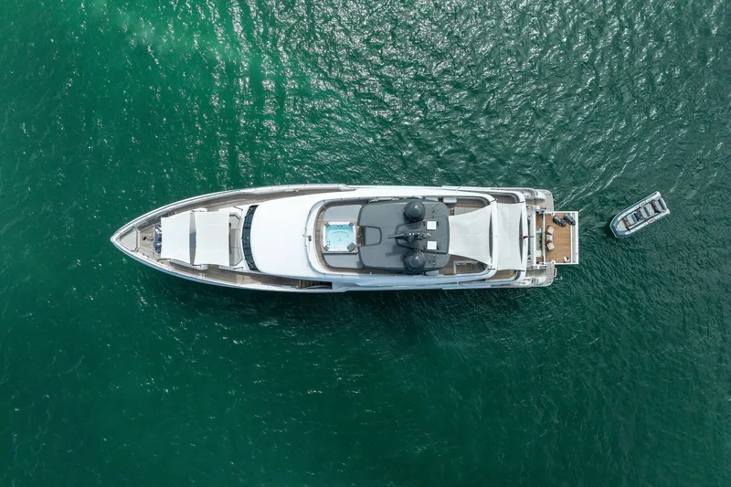 Slide: The Image of Aerial view of 2023 Custom Line Navetta 33 yacht on open water. - 20