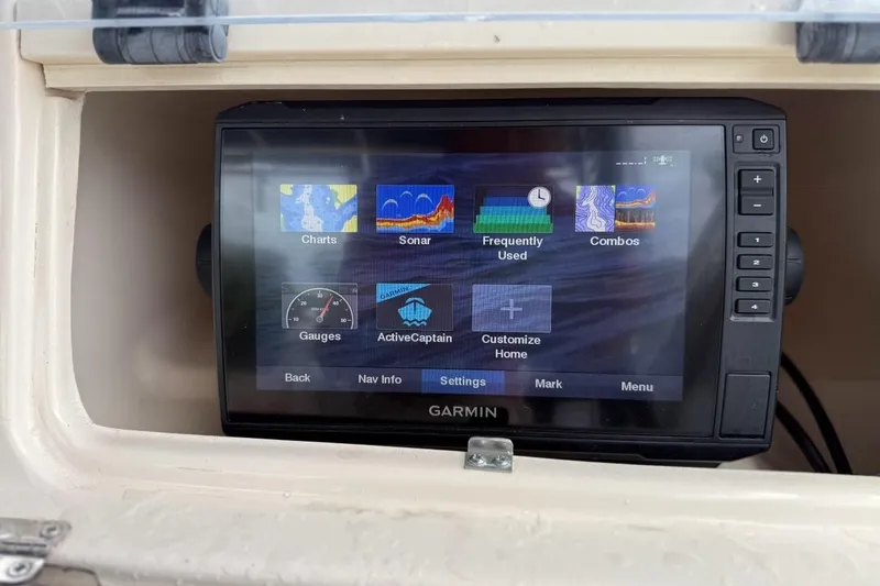 Slide: The Image of Garmin navigation system on 1999 Grady-White Islander 268 boat dashboard. - 10