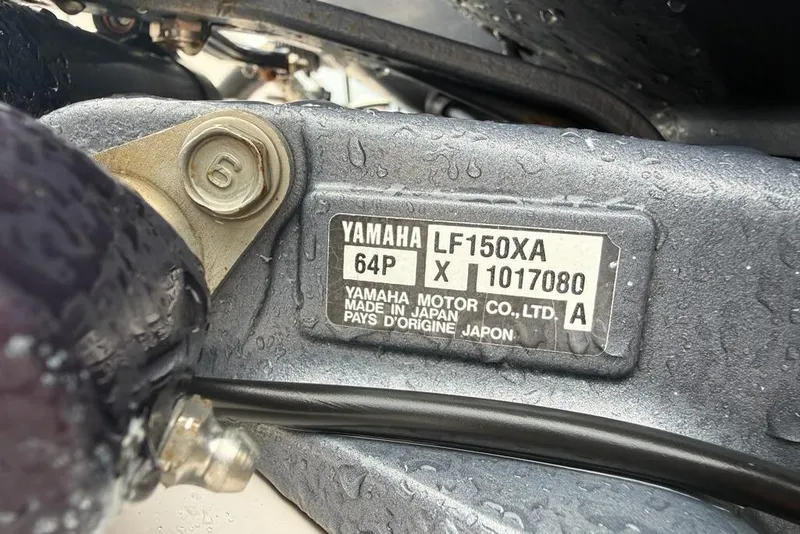 Slide: The Image of Close-up of Yamaha LF150XA engine label on a 1999 Grady-White Islander 268 boat. - 20