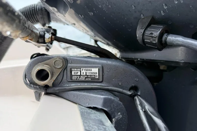 Slide: The Image of Close-up of Yamaha F150XA engine part on 1999 Grady-White Islander 268 boat. - 21