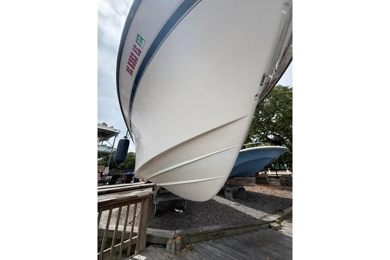 Slide: The Image of 1999 Grady-White Islander 268 boat on dry dock, viewed from below. - 6