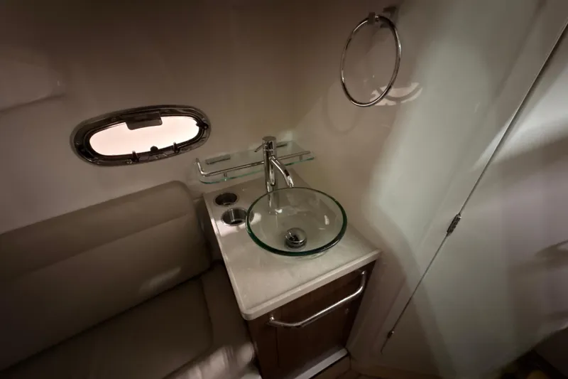 Slide: The Image of Luxurious bathroom interior of 2026 Boston Whaler 380 Outrage with modern glass sink. - 21
