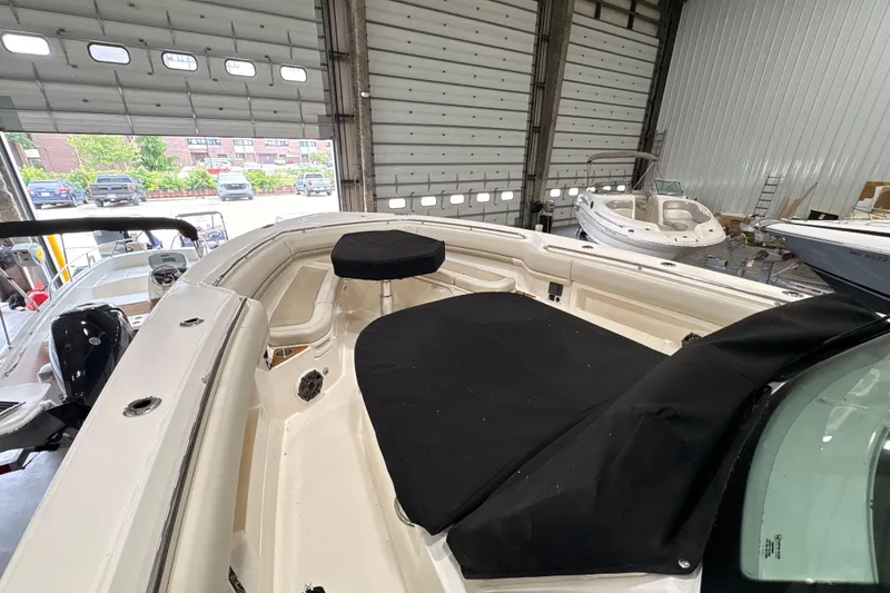 Slide: The Image of 2026 Boston Whaler 380 Outrage boat interior in a storage facility. - 24