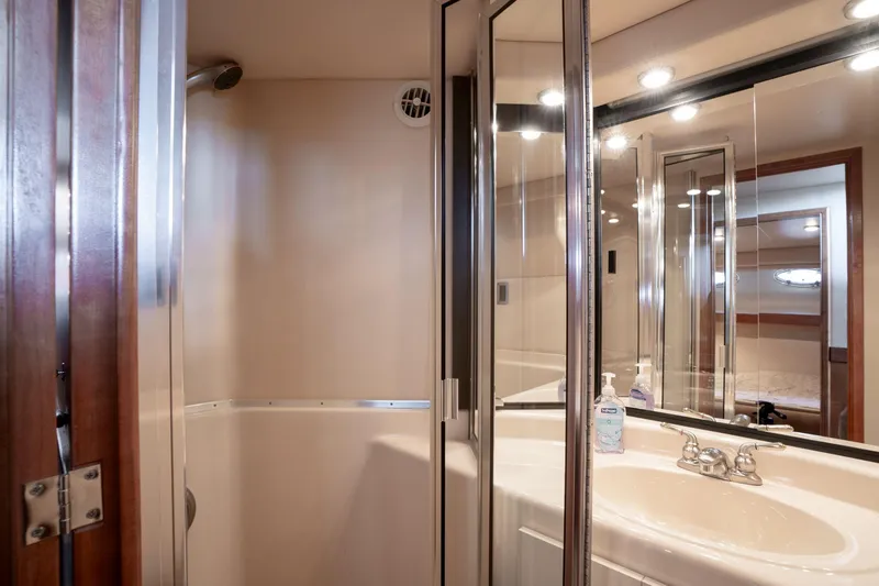 Slide: The Image of Bathroom interior of 2003 Meridian 490 Pilothouse yacht with shower and sink. - 21