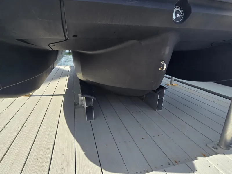 Slide: The Image of A 2024 Sea-Doo Switch on a dock, featuring a sturdy hull and modern design. - 15