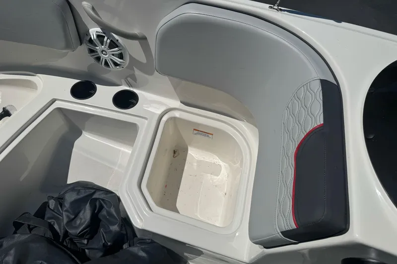 Slide: The Image of Interior of 2023 Bayliner Element M15 boat with seating and storage compartments. - 20