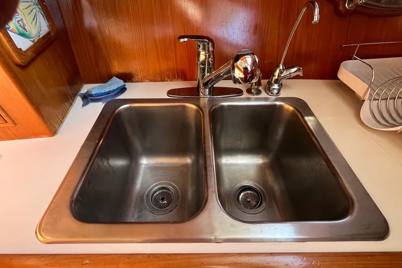 Slide: The Image of Stainless steel double sink in 1989 Ocean Alexander 440 Sundeck CPMY yacht kitchen. - 12