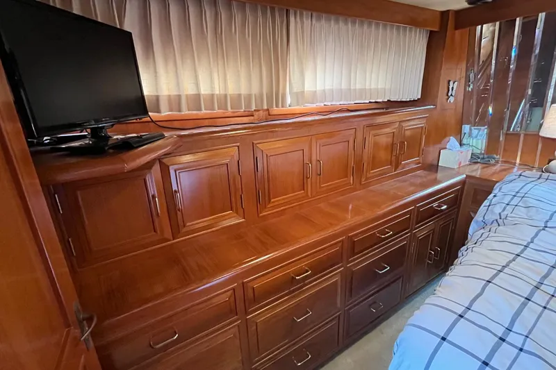 Slide: The Image of Luxurious wooden cabinetry in 1989 Ocean Alexander 440 Sundeck CPMY yacht interior. - 15