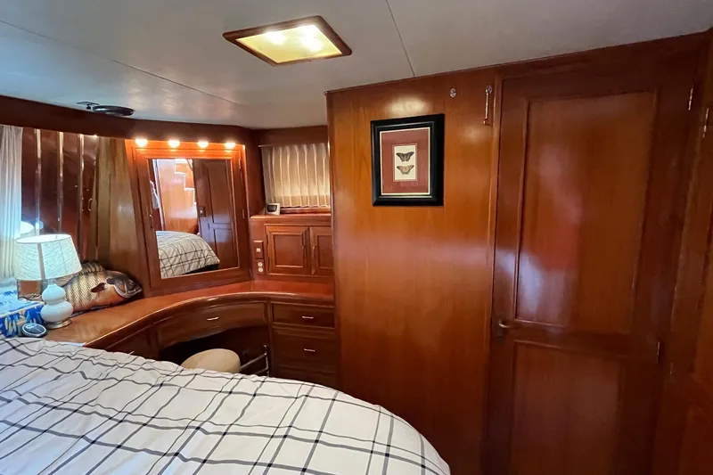 Slide: The Image of Luxurious 1989 Ocean Alexander 440 Sundeck CPMY cabin with elegant wood interior. - 16
