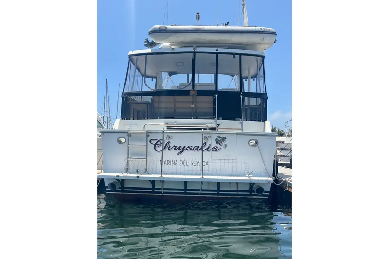 Slide: The Image of 1989 Ocean Alexander 440 Sundeck CPMY docked at Marina del Rey, rear view. - 32