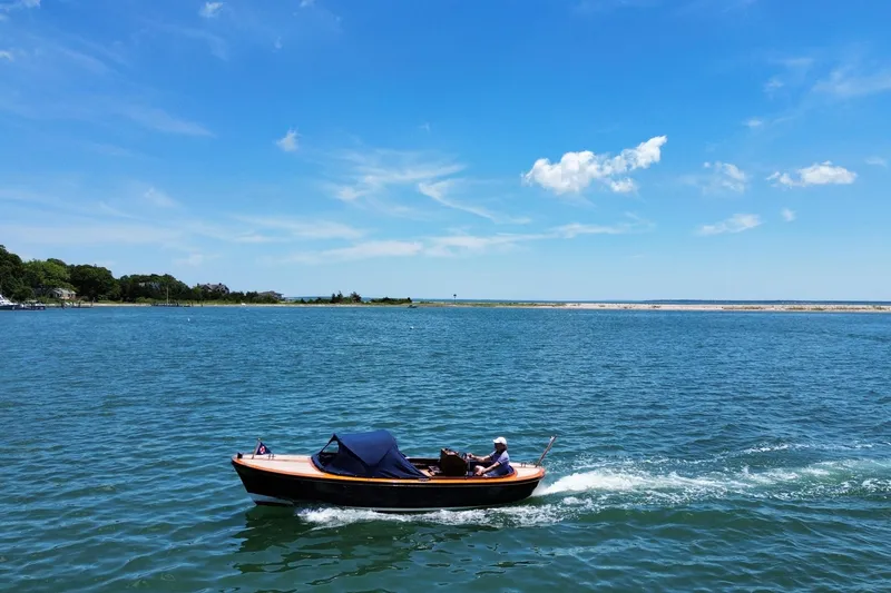 Slide: The Image of Small boat cruising on a sunny day, Castine Harbor Launch 2003 model. - 11
