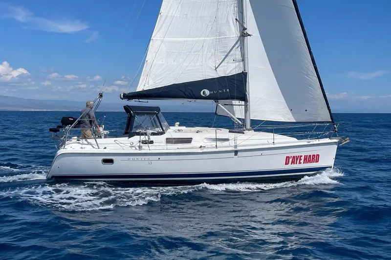 The Image of Sailing yacht "D'aye Hard," Hunter 33.5, 2004 model, cruising on open sea. - 0