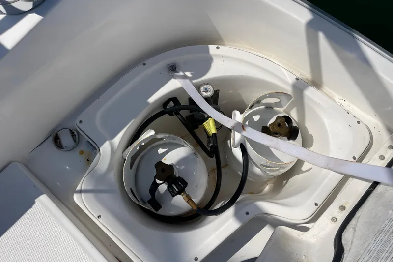 Slide: The Image of Propane tank storage on 2004 Hunter 33-2 sailboat deck. - 27
