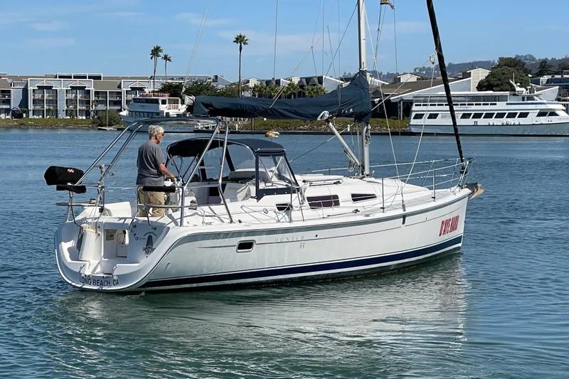 Slide: The Image of 2004 Hunter 33-2 sailboat on calm water near Long Beach, California. - 7