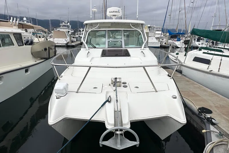 Slide: The Image of 2013 Glacier Bay 2680 Coastal Runner boat docked at marina, front view. - 1