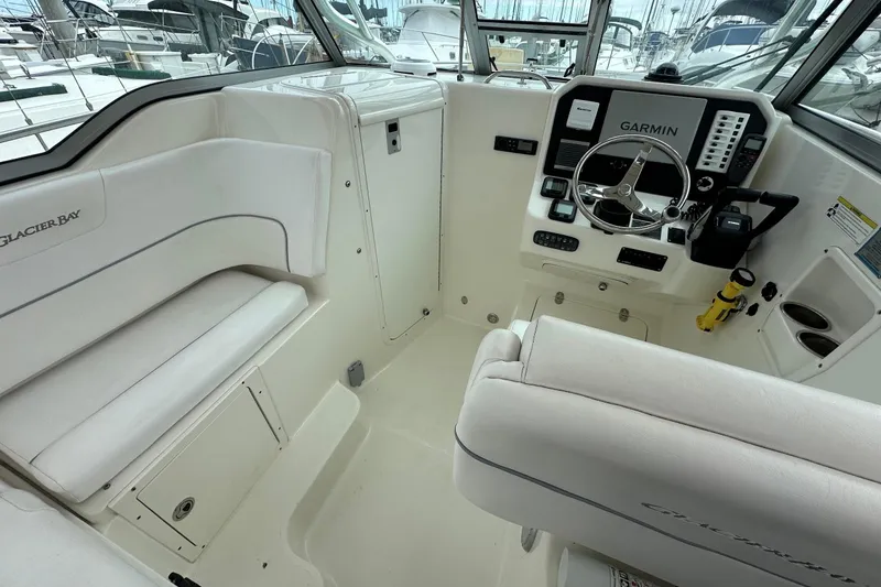 Slide: The Image of Interior of 2013 Glacier Bay 2680 Coastal Runner boat with Garmin navigation system. - 14
