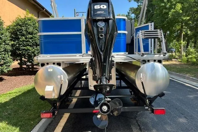 Slide: The Image of 2026 Sun Tracker Party Barge 18 DLX pontoon boat with powerful outboard motor. - 3