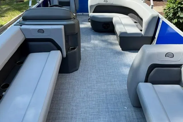 Slide: The Image of 2026 Sun Tracker Party Barge 18 DLX interior with spacious seating and modern design. - 5