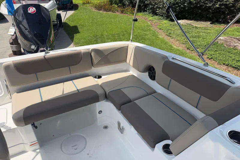 Slide: The Image of 2026 Tahoe 1950 boat interior with cushioned seating and modern design. - 22