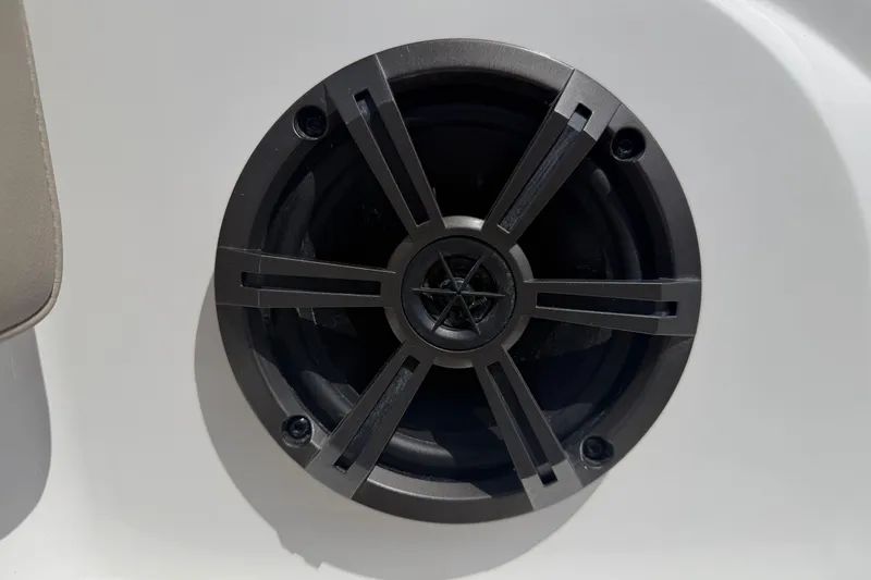 Slide: The Image of Close-up of a black speaker on a 2026 Tahoe 1950 boat. - 8