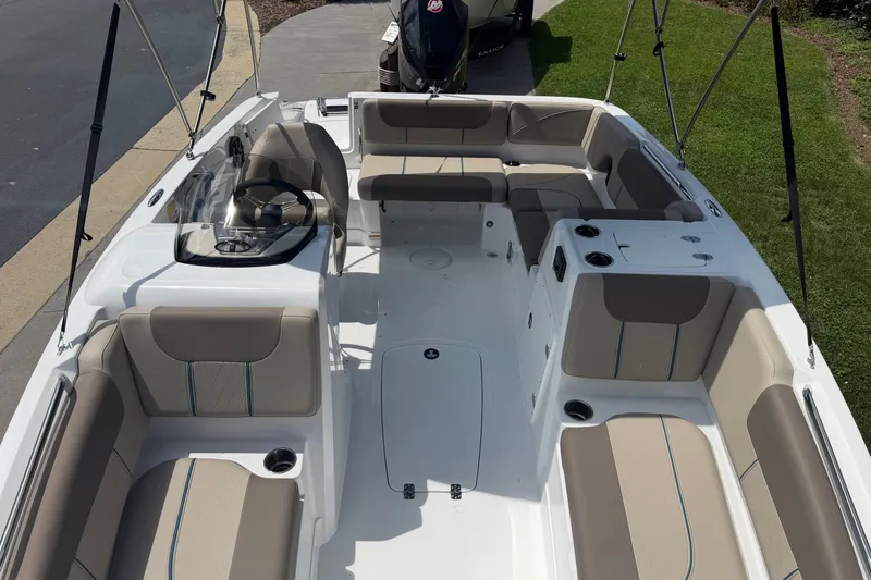 Slide: The Image of 2026 Tahoe 1950 boat interior with spacious seating and modern design. - 5