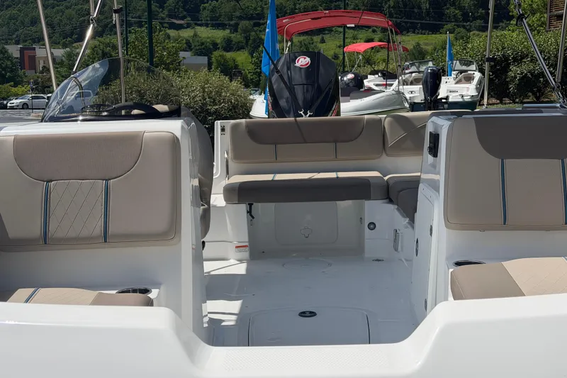 Slide: The Image of Interior view of a 2026 Tahoe 1950 boat, featuring spacious seating and modern design. - 15