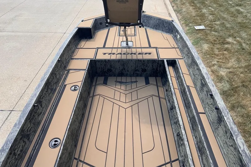 Slide: The Image of 2026 Tracker Grizzly 1756 T Marsh boat interior with camo design and spacious layout. - 5