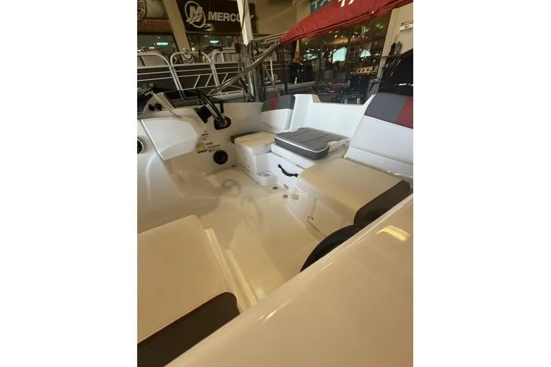 Slide: The Image of 2026 Tahoe T16 boat interior with seating and storage compartments. - 9
