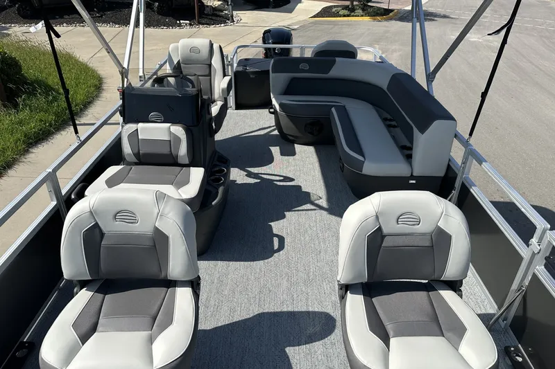 Slide: The Image of 2026 Sun Tracker Bass Buggy 18 DLX pontoon boat with spacious seating and modern design. - 104