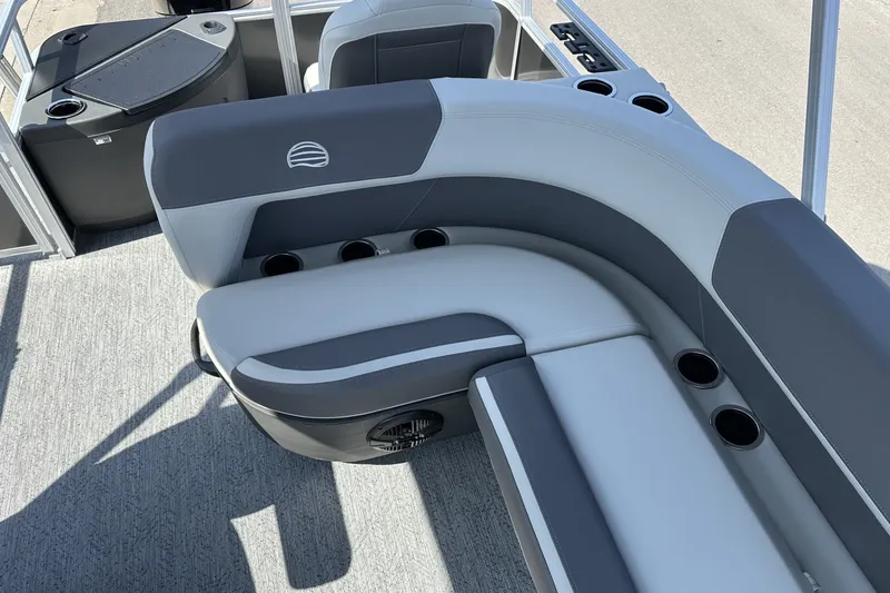Slide: The Image of 2026 Sun Tracker Bass Buggy 18 DLX pontoon boat seating with cup holders. - 22