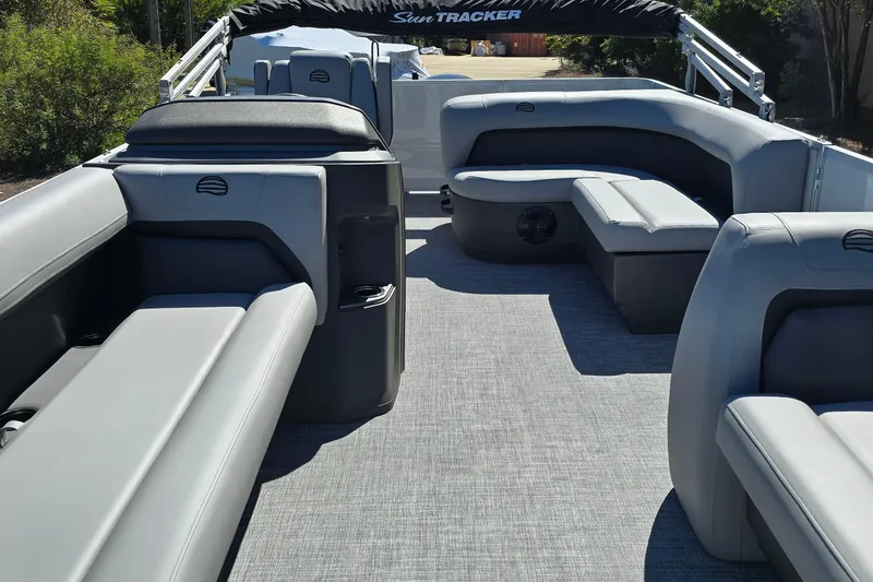 Slide: The Image of 2026 Sun Tracker Party Barge 18 DLX interior with spacious seating and modern design. - 7