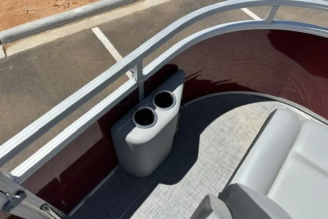 Slide: The Image of Interior of 2026 Sun Tracker SportFish 20 DLX pontoon boat with cup holders and seating. - 28