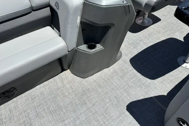 Slide: The Image of 2026 Sun Tracker SportFish 20 DLX interior with gray seating and flooring. - 15