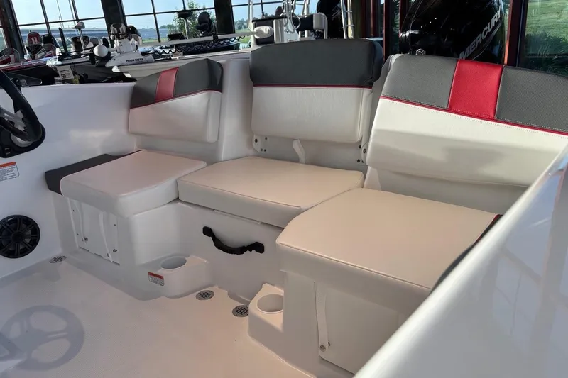 Slide: The Image of Interior seating of 2026 Tahoe T16 boat with red and gray accents. - 12