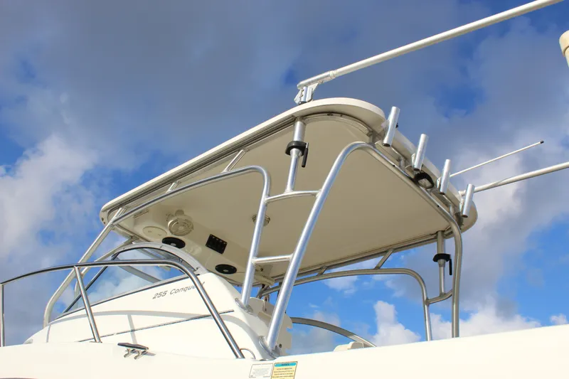 Slide: The Image of Boston Whaler 255 Conquest 2005 boat with T-top against a blue sky. - 28