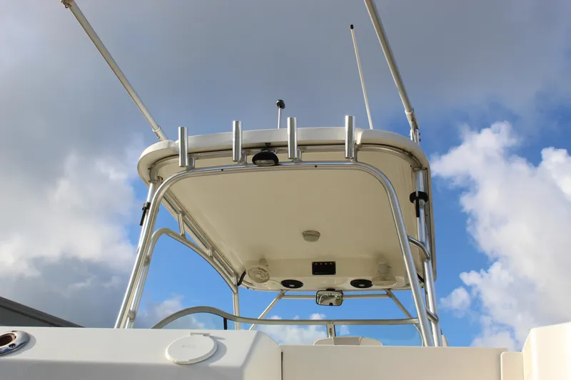 Slide: The Image of Boston Whaler 255 Conquest 2005 boat top view against cloudy sky. - 29